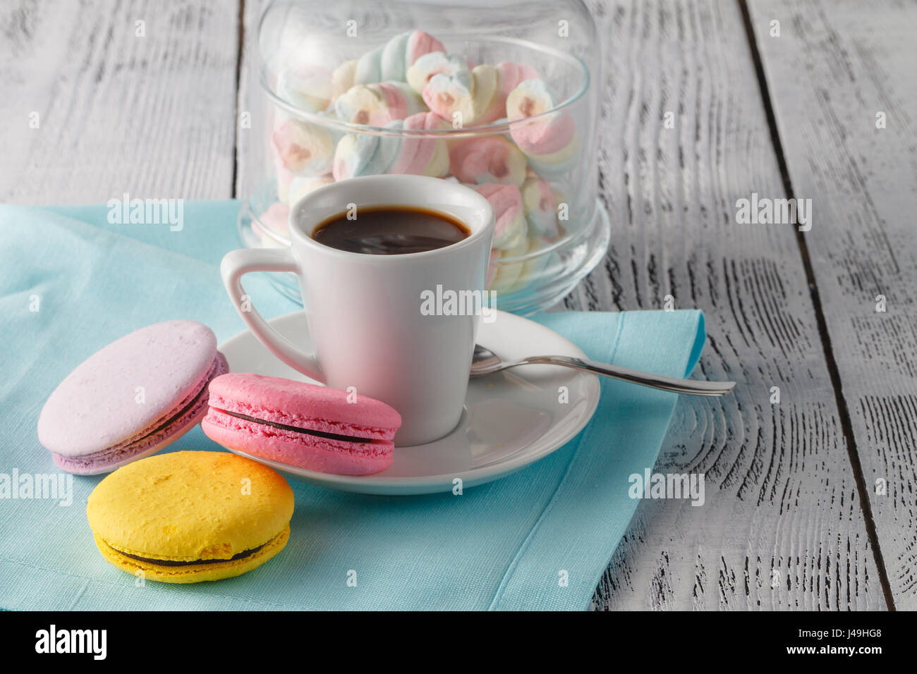 Breakfast with French colorful macarons and a espresso coffee cup Stock Photo
