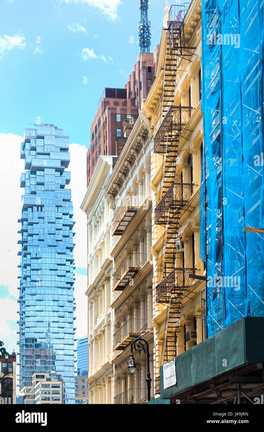 A new Modern skyscraper at 56 Leonard Street in Tribeca of unique design seen from the historic cast iron district of SoHo Stock Photo