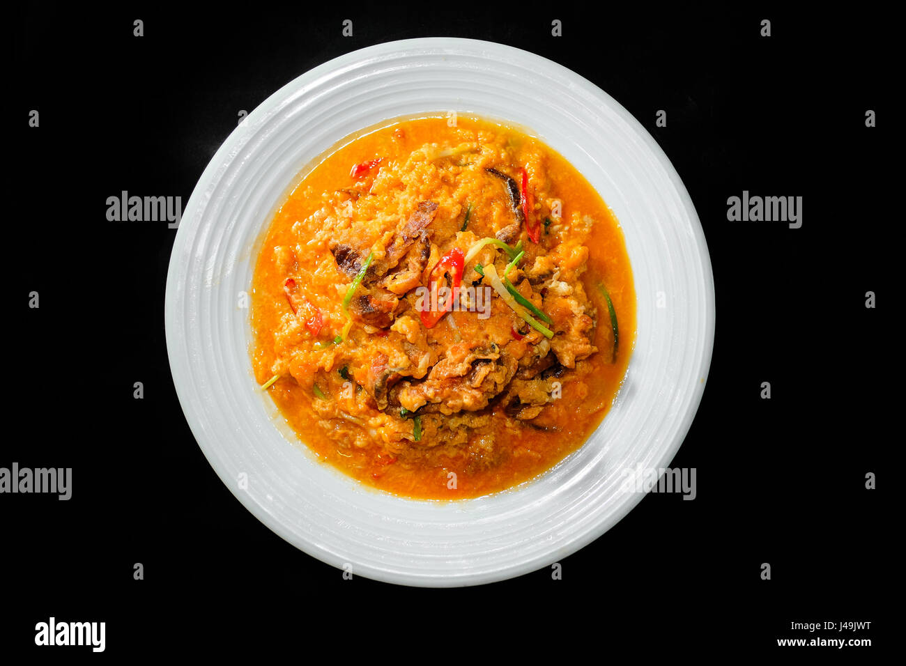 Seafood with Yellow curry sauce, sauteed seafood contains fish, shrimp