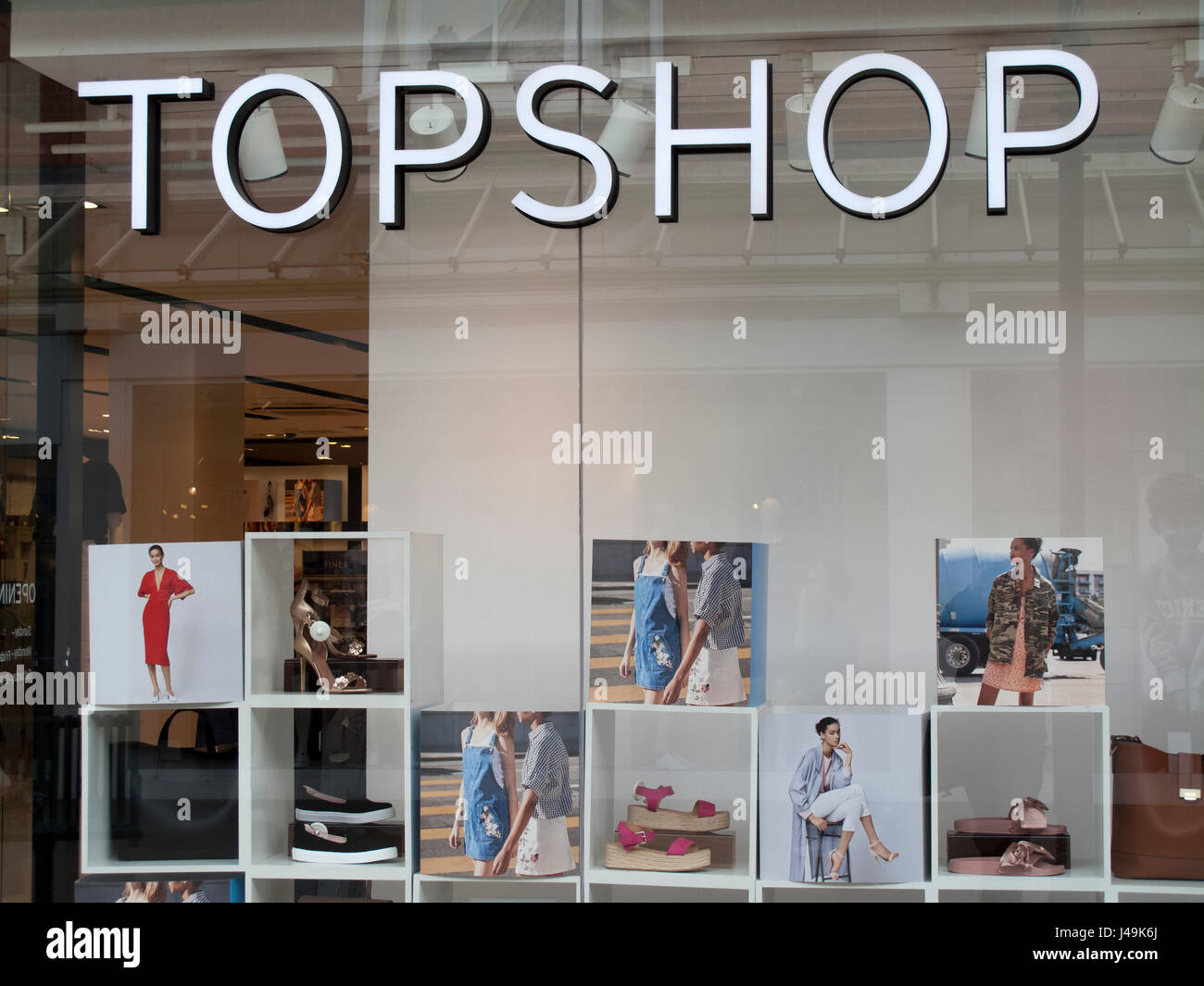 Topshop ladies high street fashion store sign and window display, part of  the Arcadia Group owned by Sir Philip Nigel Ross Green Stock Photo - Alamy