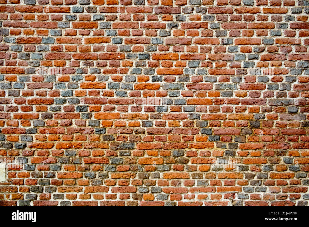 Old patterned red brick wall full frame texture background Stock Photo ...