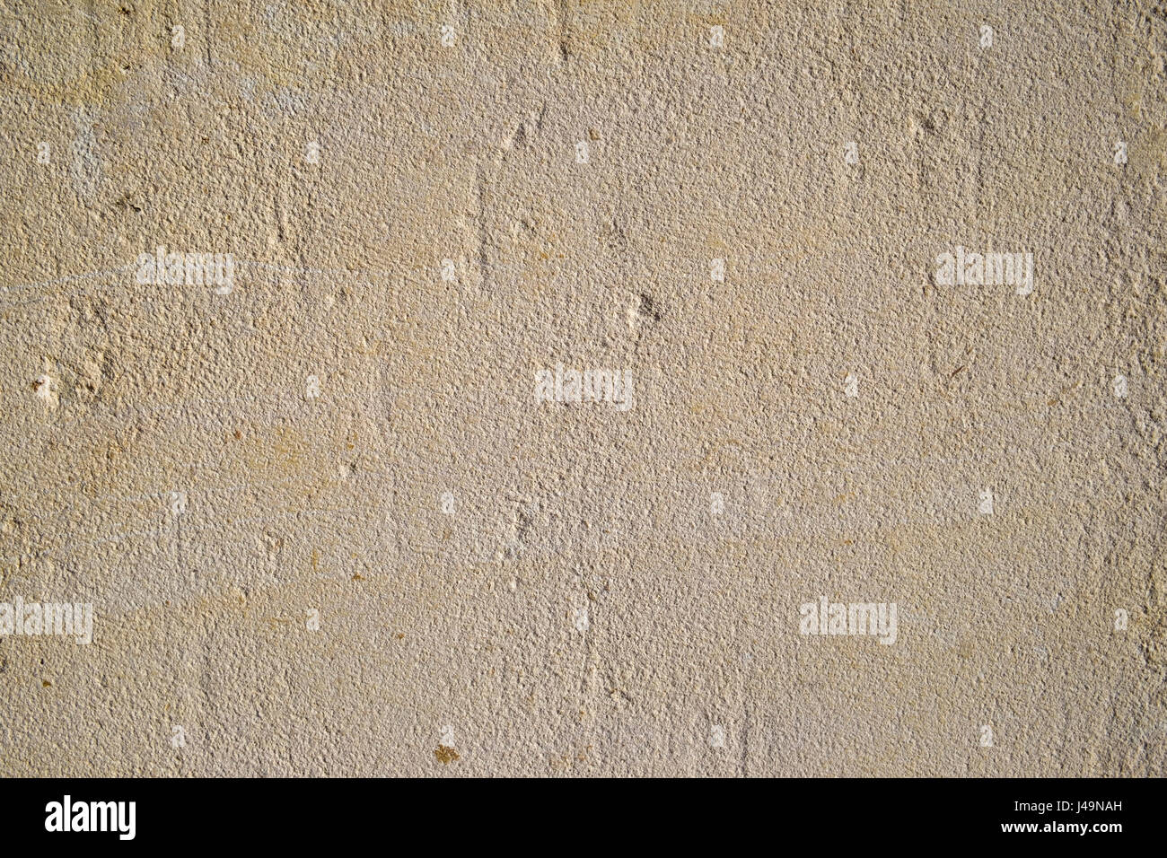 Rough rendered exterior wall full frame background texture Stock Photo