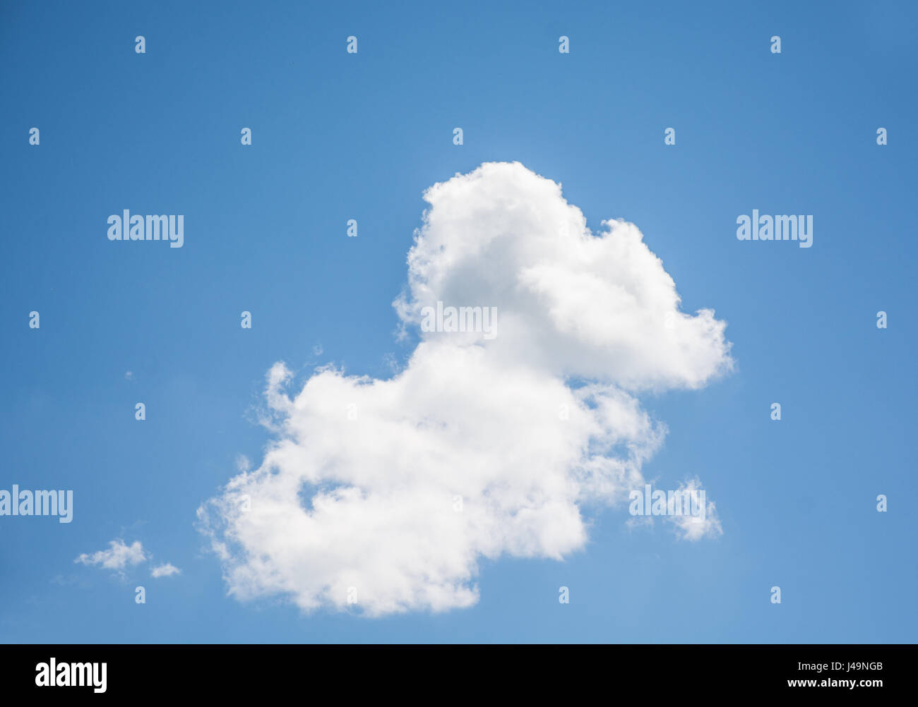 white clouds in the blu summer sky Stock Photo