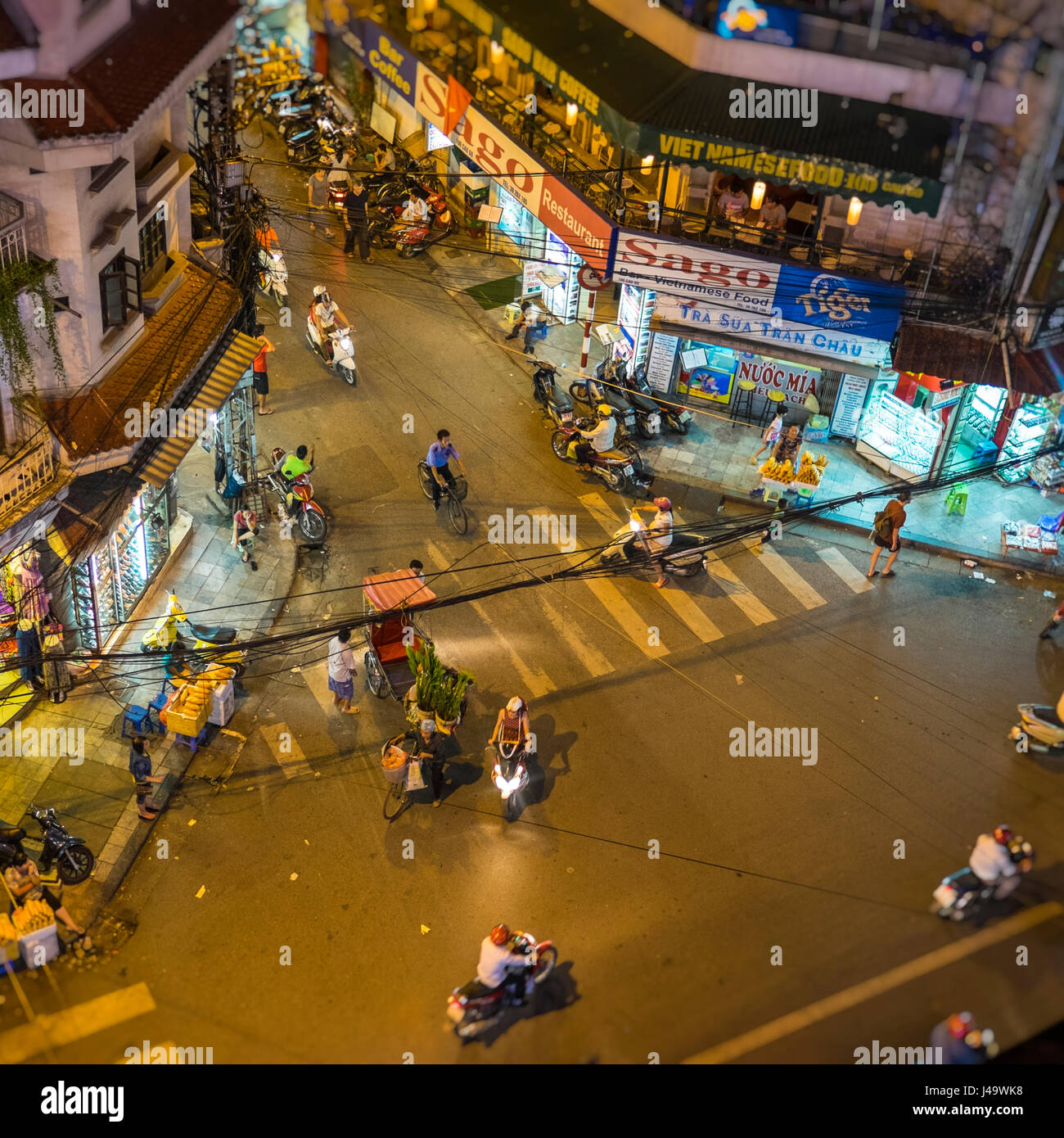 HANOI, VIETNAM CIRCA SEPTEMBER 2014 Busy corner street in the Hanoi