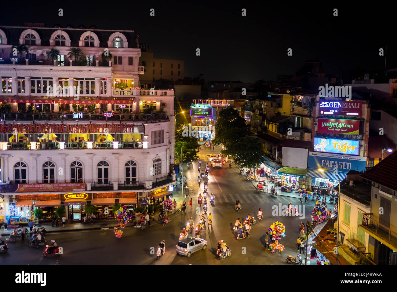 HANOI, VIETNAM CIRCA SEPTEMBER 2014 Busy corner street in the Hanoi