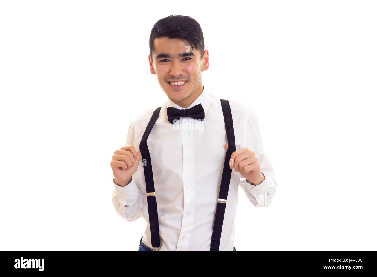Young man with bow-tie and suspenders Stock Photo