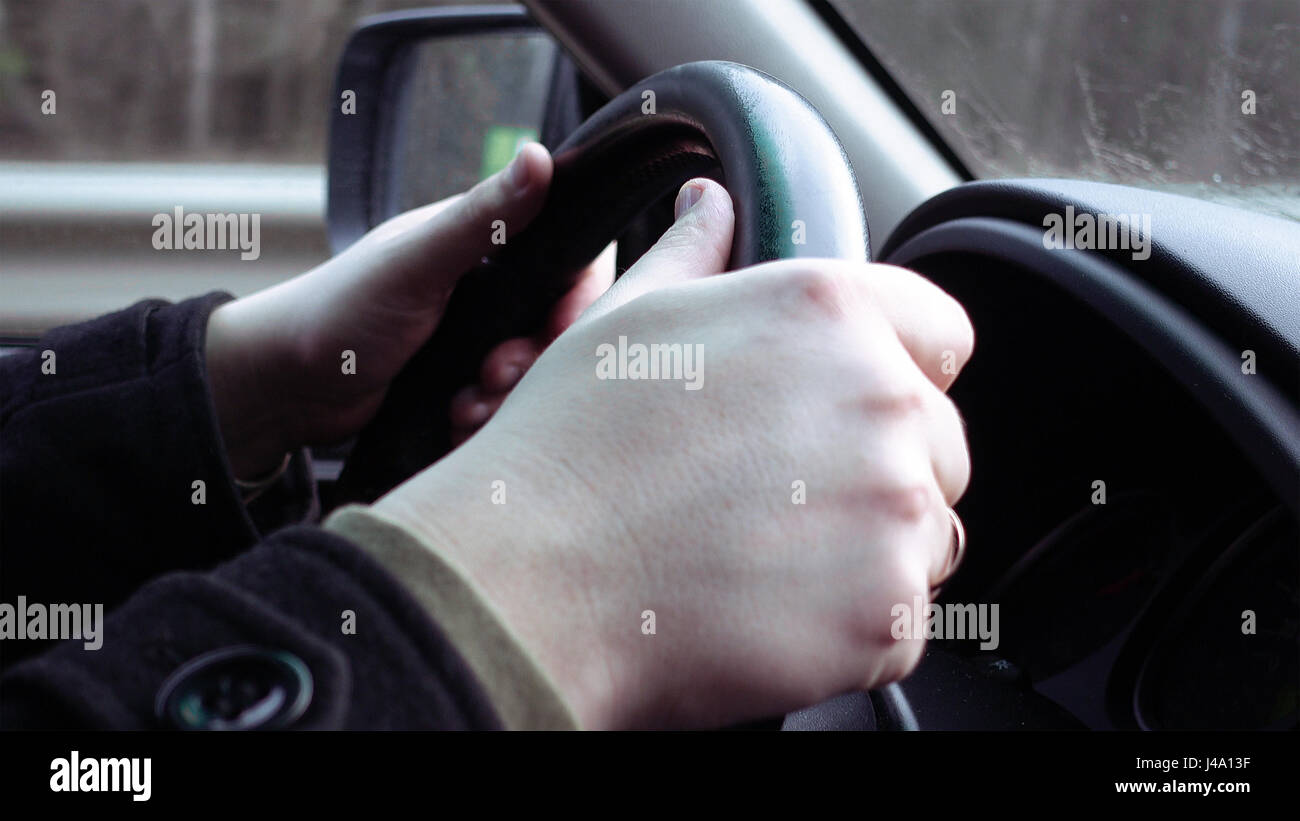 Hands steering wheel hi-res stock photography and images - Alamy