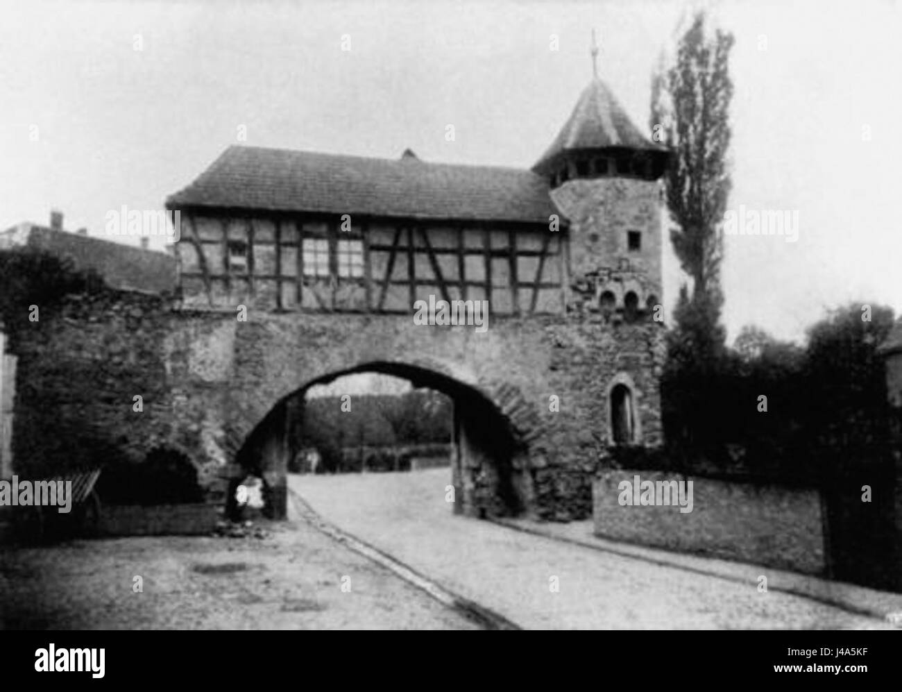 This image from before 1885 shows the Rinnentor, a historic gate or landmark, which is part of the cultural and architectural heritage of the region. Stock Photo