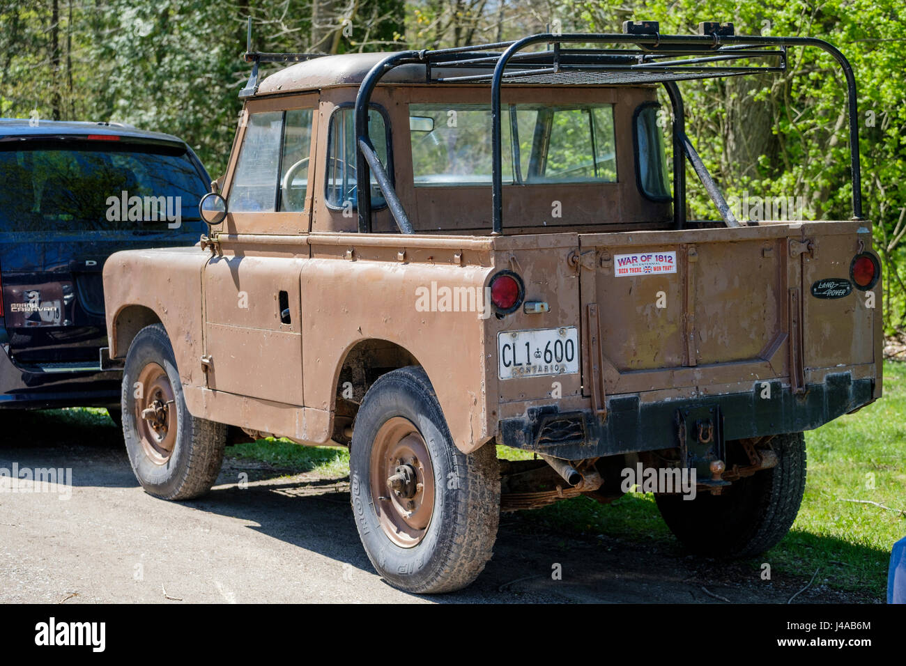 1963, old Land Rover Series IIa, Series 2a, Series 2, 88, pick-up truck, 4x4 all-terrain vehicle, modified, back view, view from behind, 1960s Stock Photo