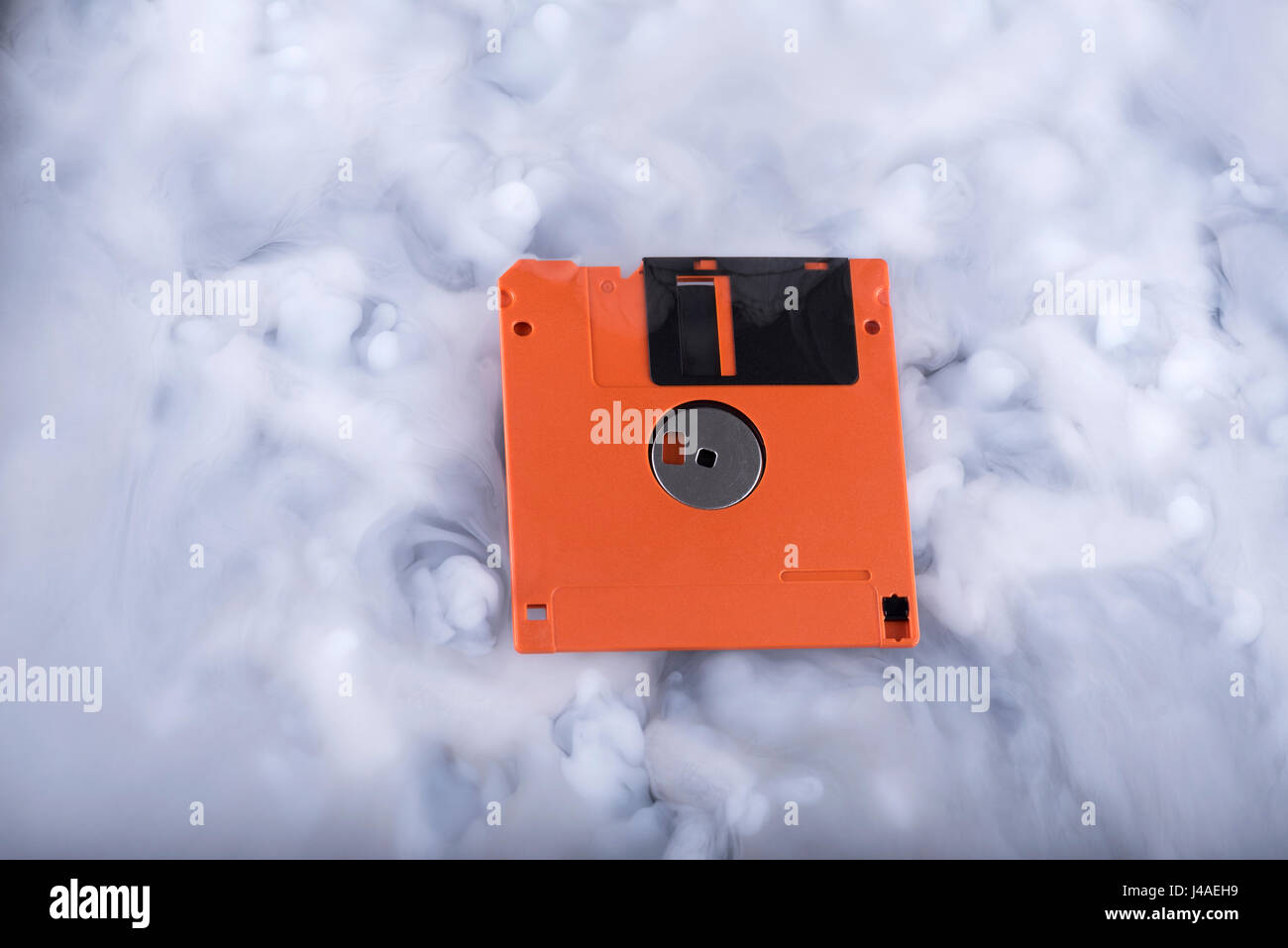 Floppy disk in a clouds Stock Photo