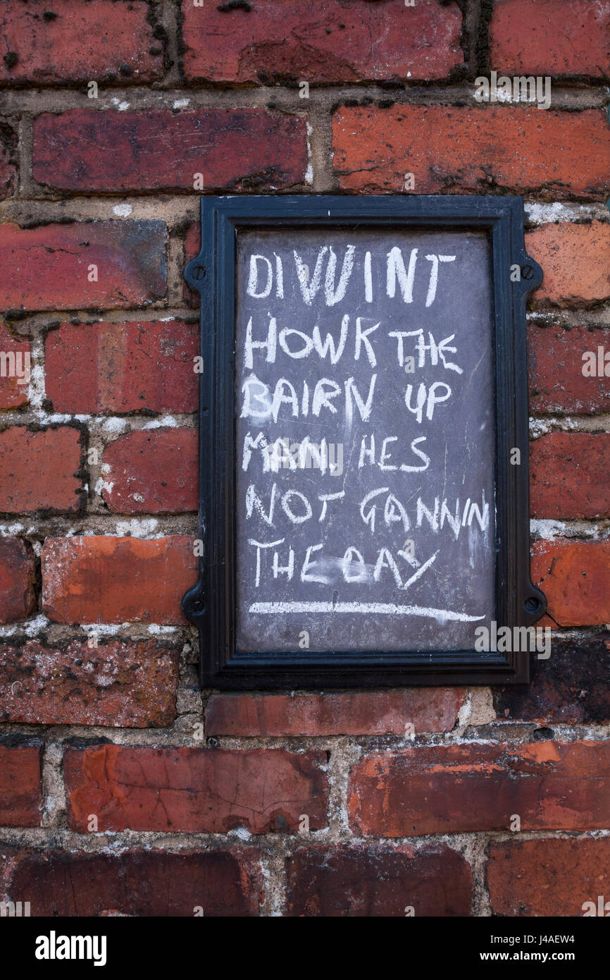 Message in Northern dialect on Notice board at rear of house at Beamish Museum,England,UK Stock Photo