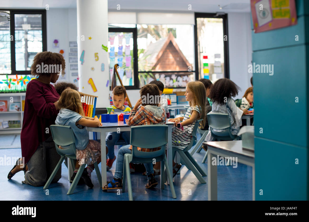 Group of diverse students at daycare Stock Photo