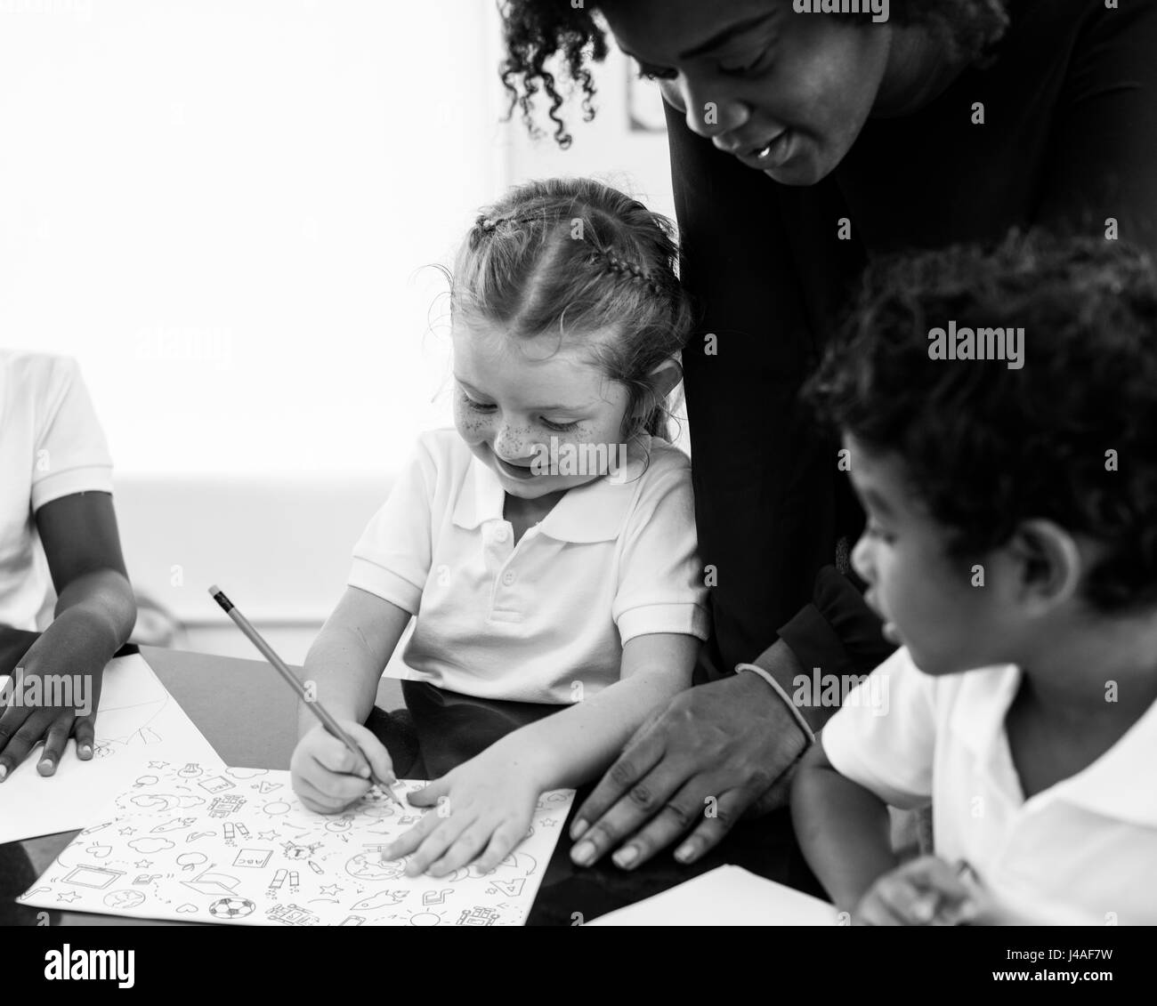 Group of diverse students drawing in art class Stock Photo Alamy