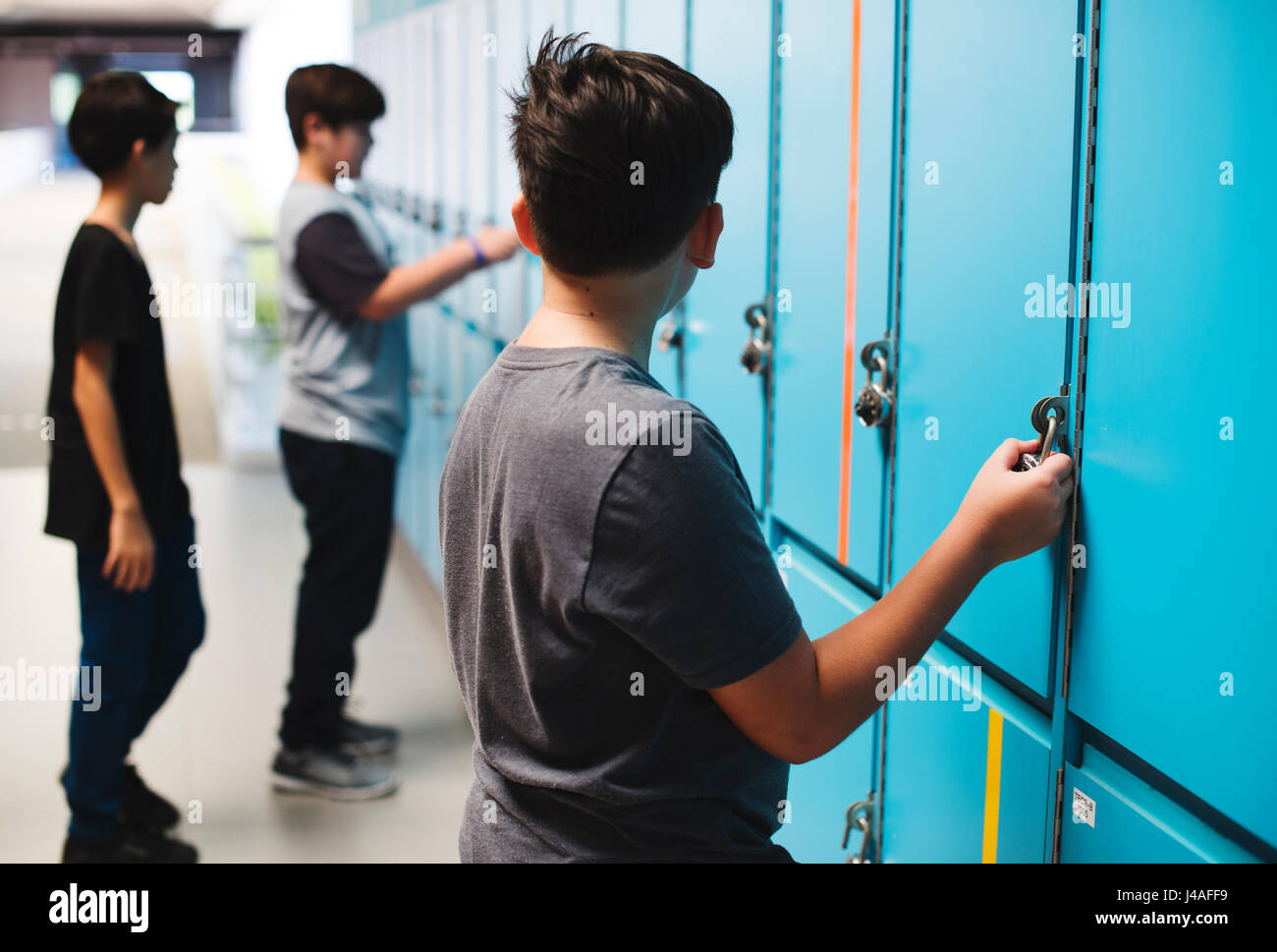 Students friends at lockers room Stock Photo