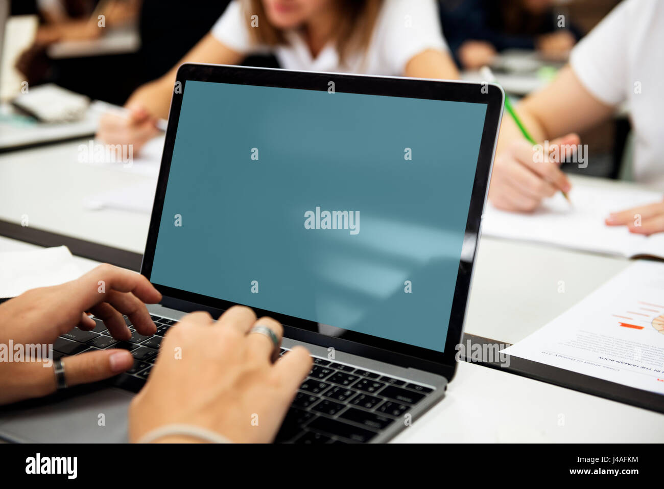Students e-learning with laptop Stock Photo - Alamy
