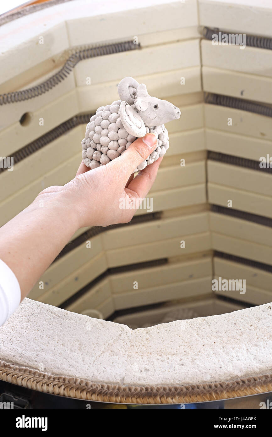 of artistic ceramics. Burning pottery in the oven. Clay