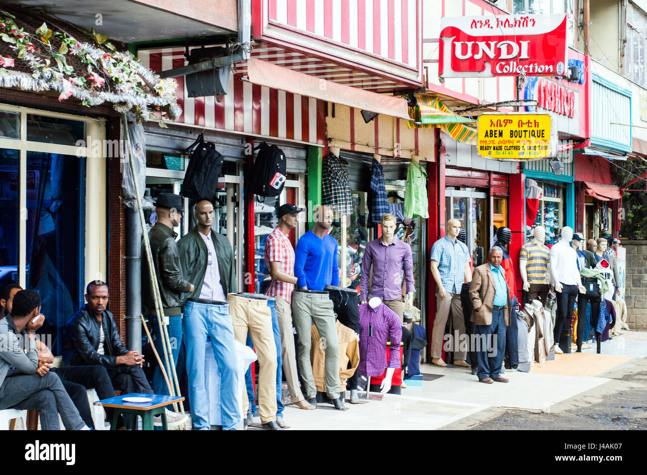 Street scene with menswear shops, Piazza, Addis Ababa, Ethiopia Stock Photo