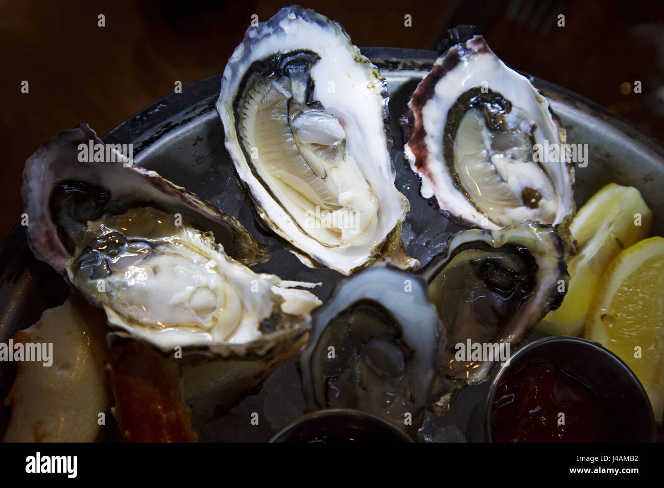 Pacific oysters served in Vancouver, Canada. The oyster are locally sourced Stock Photo Alamy