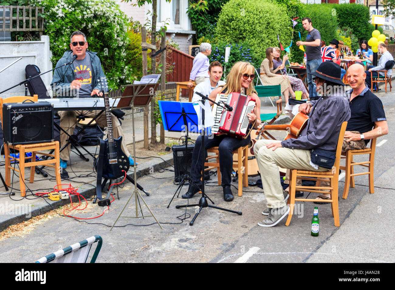 A musical get-together at a Royal Wedding street party in Islington, North London, UK Stock Photo
