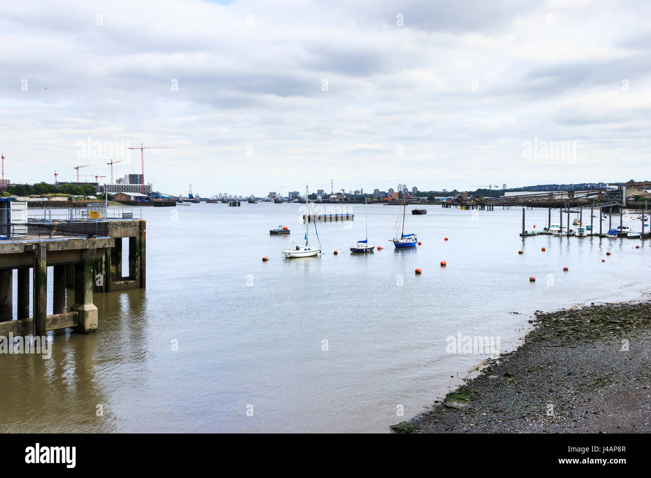 The River Thames at North Greenwich, looking downriver towards the Thames Barrier Stock Photo