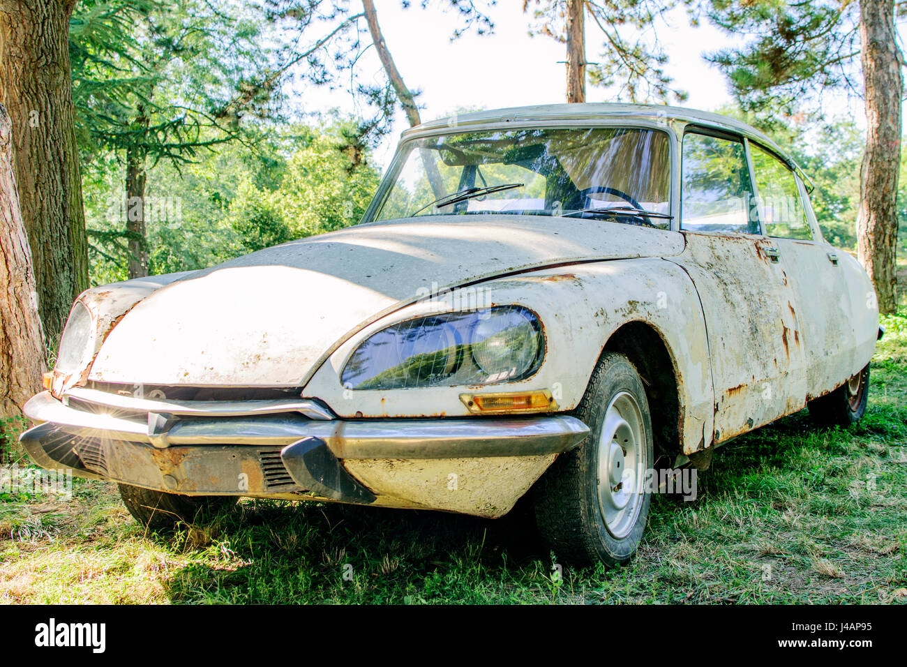 Rusty vintage car. Old-timer wreck Stock Photo