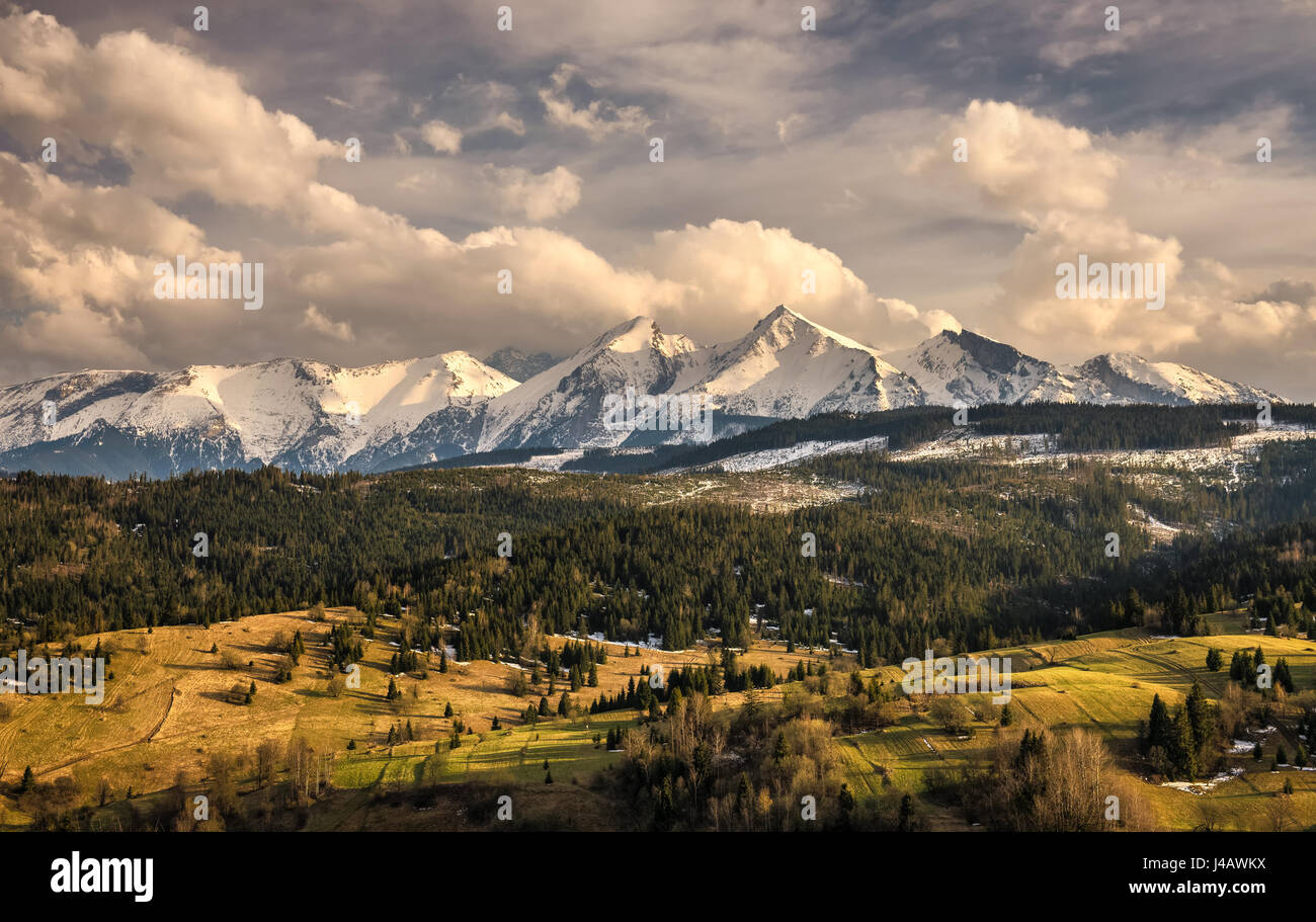 Spring comes to the snowy high tatra mountains. High Tatras is a  mountain range along the border of northern Slovakia and southern Poland. Stock Photo