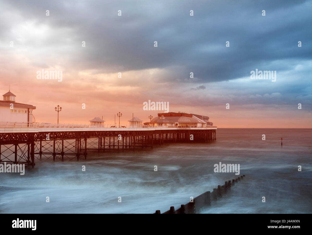 Cromer pier in a storm Stock Photo