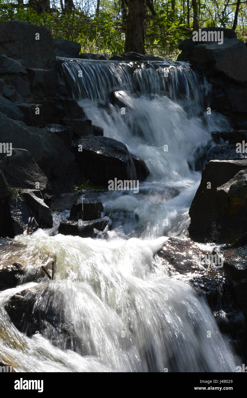 Waterfall at the park Stock Photo - Alamy