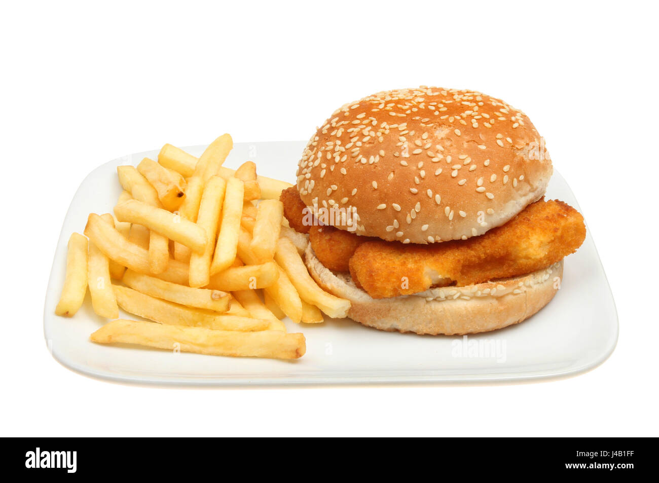 Fish burger, fish fingers in a burger bun with French fries on a plate isolated against white Stock Photo