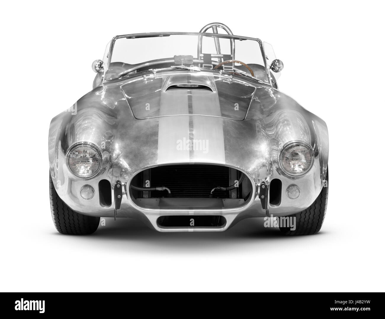 License and prints at MaximImages.com - 1967 Shelby Cobra AC Roadster 427 retro sports car in reflective chrome finish, front view isolated on white Stock Photo