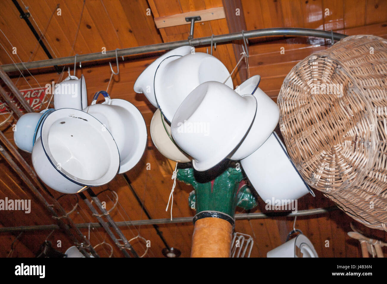 Pans hanging from ceiling hooks at the Co-operative store at Beamish Museum,England,UK Stock Photo