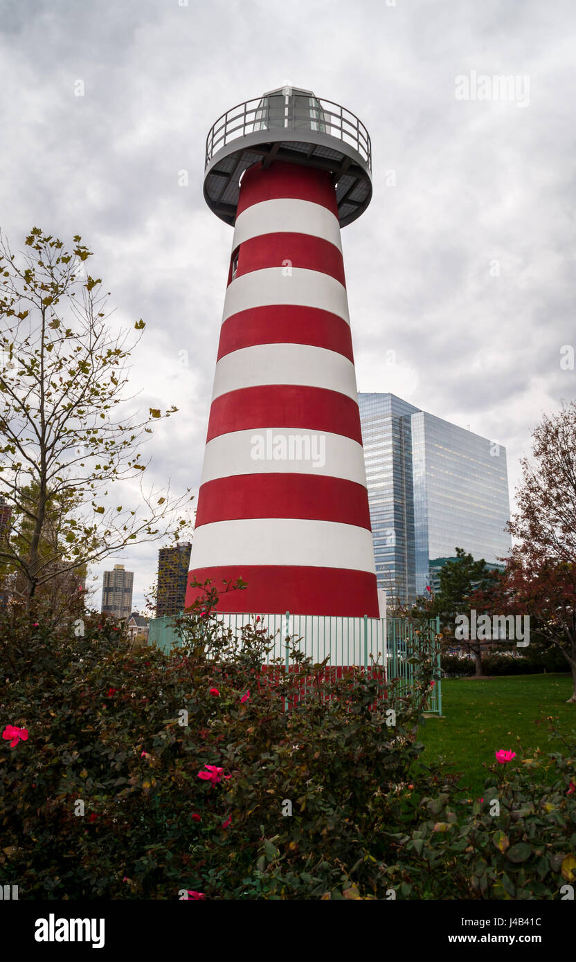 LeFrak Point lighthouse, a traditional red and white striped lighthouse