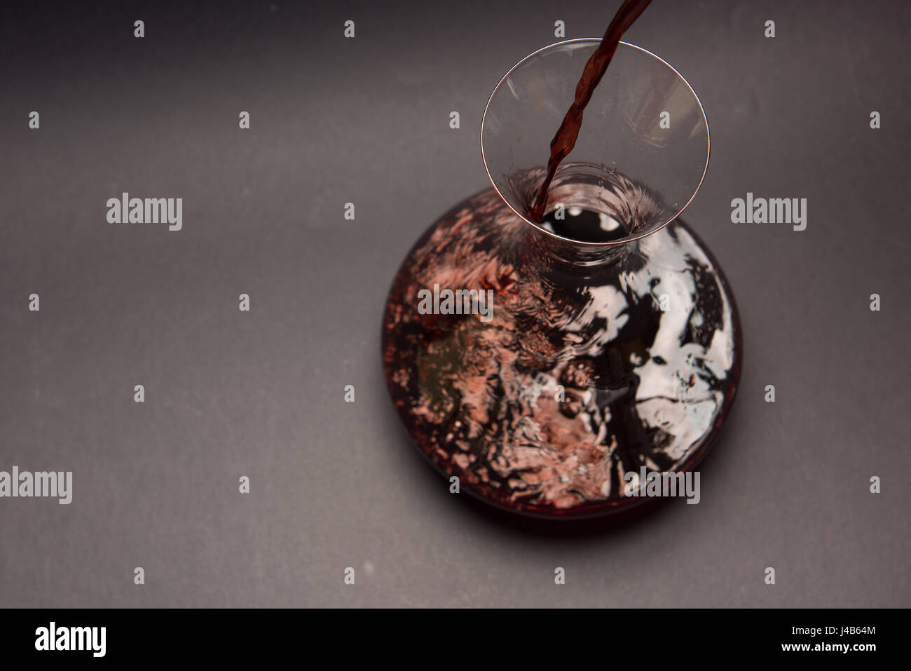 Decanting red wine Stock Photo Alamy