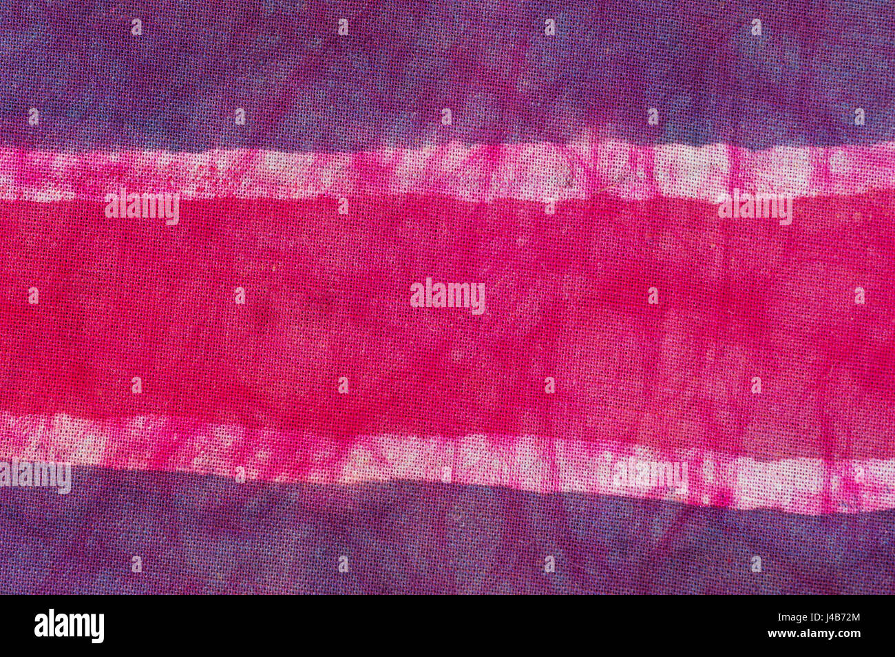 Pink Tie Dye Batik Fabric For Background And Texture Stock Photo