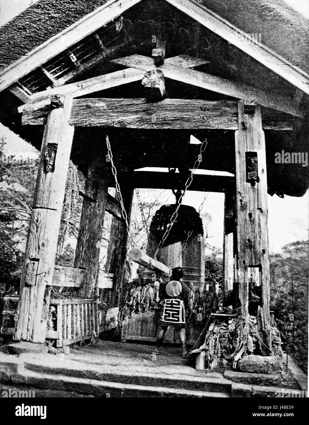 This bronze bell in Ueno Park, Tokyo, is a historical monument. Ueno Park, a cultural and historical site, houses this bell, which is a part of Japan’s heritage and its rich history in the arts and culture. Stock Photo