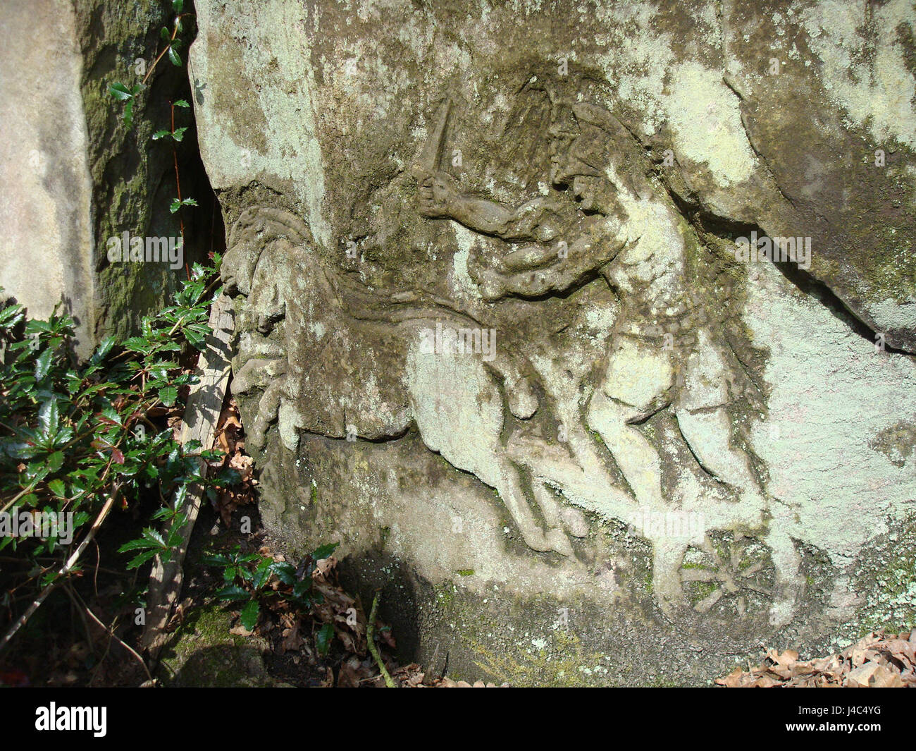 Rock carving of chariot at Wakehurst Stock Photo Alamy