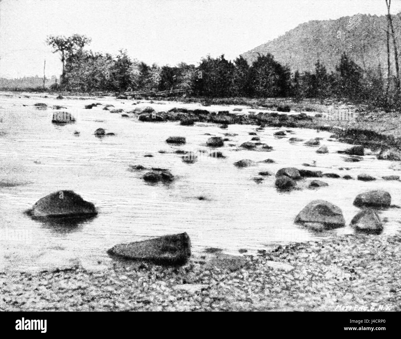 This reference describes a geological feature known as the Bowlder pavement located on Georgian Bay, Canada. The Bowlder pavement refers to large rock fragments and surfaces shaped by glacial activity. Stock Photo