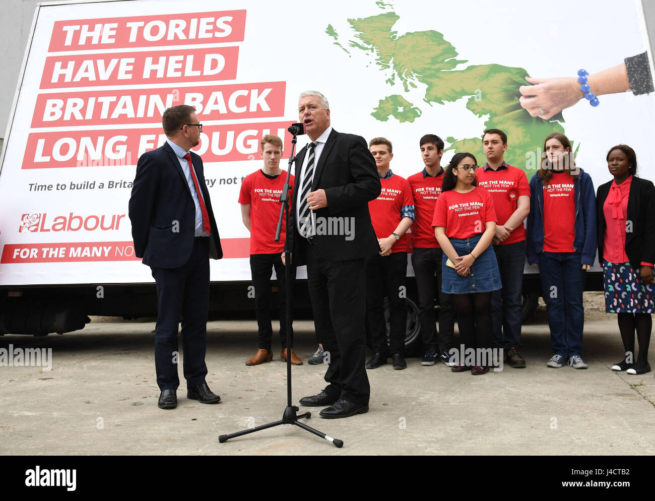 National Elections and Campaign Coordinators Ian Lavery (speaking) and Andrew Gwynne reveal a new poster for Labour's General Election campaign in London. Stock Photo
