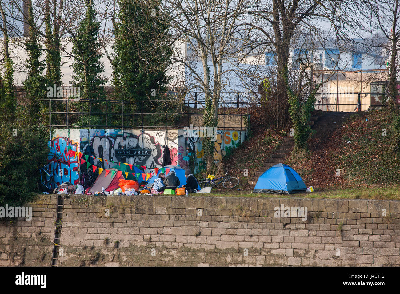 Rough sleepers in a small tented camp on the banks of the River Avon, Bristol. Stock Photo
