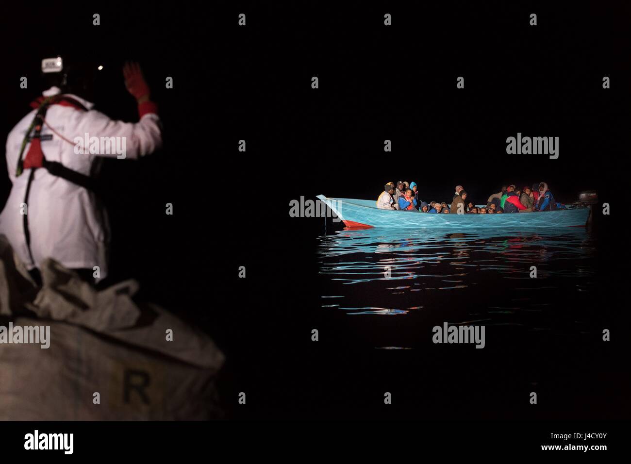 Refugees, who got rescued from distress at sea in international waters ...