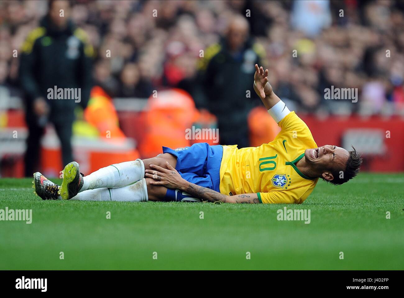 NEYMAR OF BRAZIL IS STAMPED ON BRAZIL V CHILE EMIRATES STADIUM LONDON ENGLAND 29 March 2015 Stock Photo