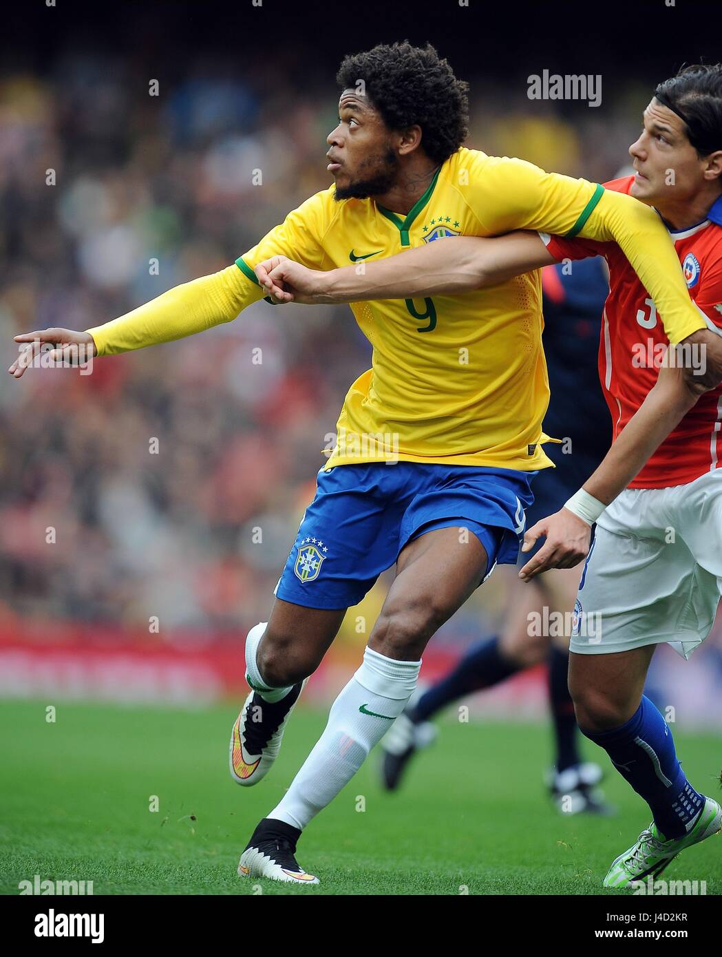 LUIZ ADRIANO OF BRAZIL IS CHAL BRAZIL V CHILE EMIRATES STADIUM LONDON ENGLAND 29 March 2015 Stock Photo