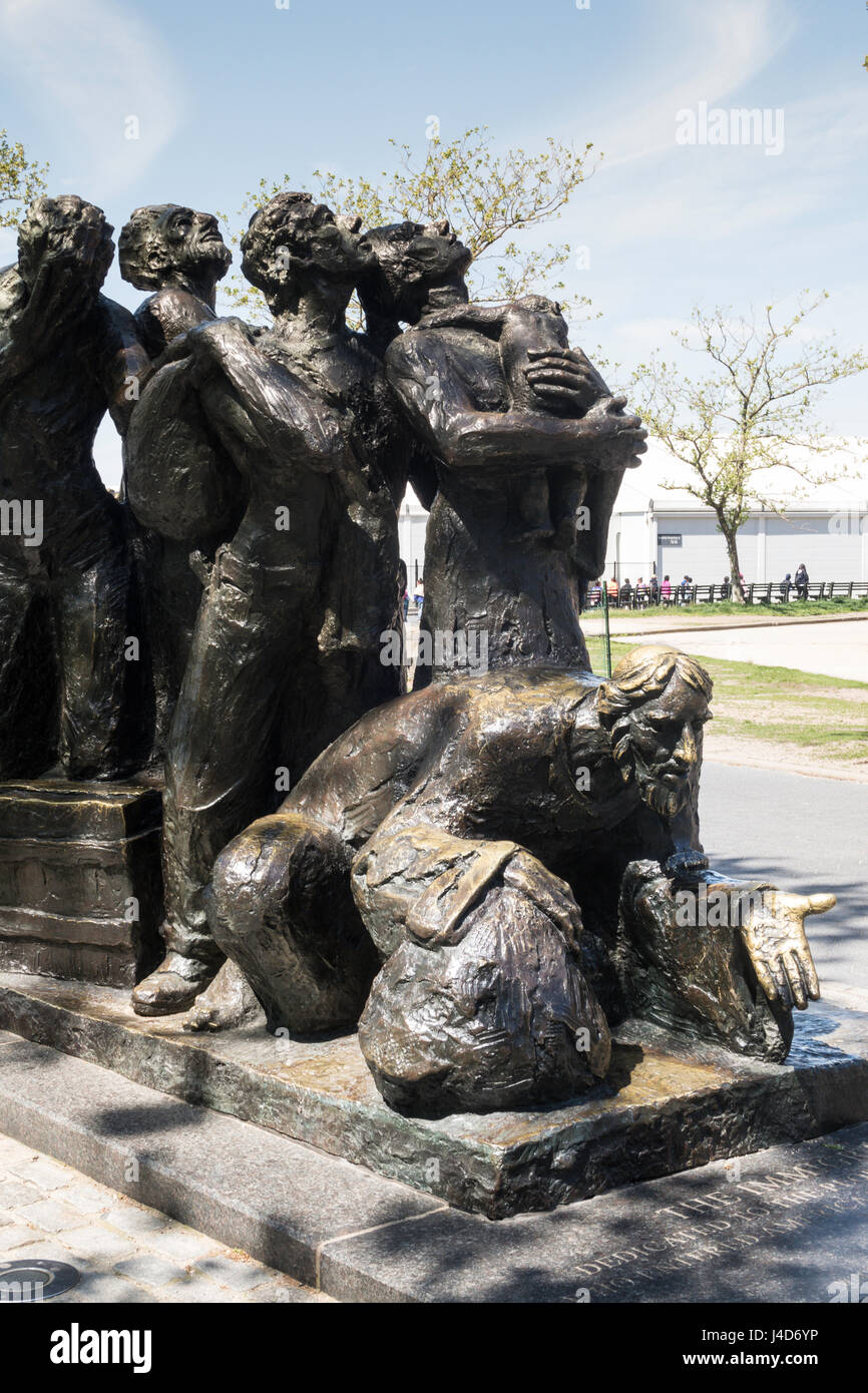 The Immigrants Statue, Battery Park, New York City, USA Stock Photo Alamy