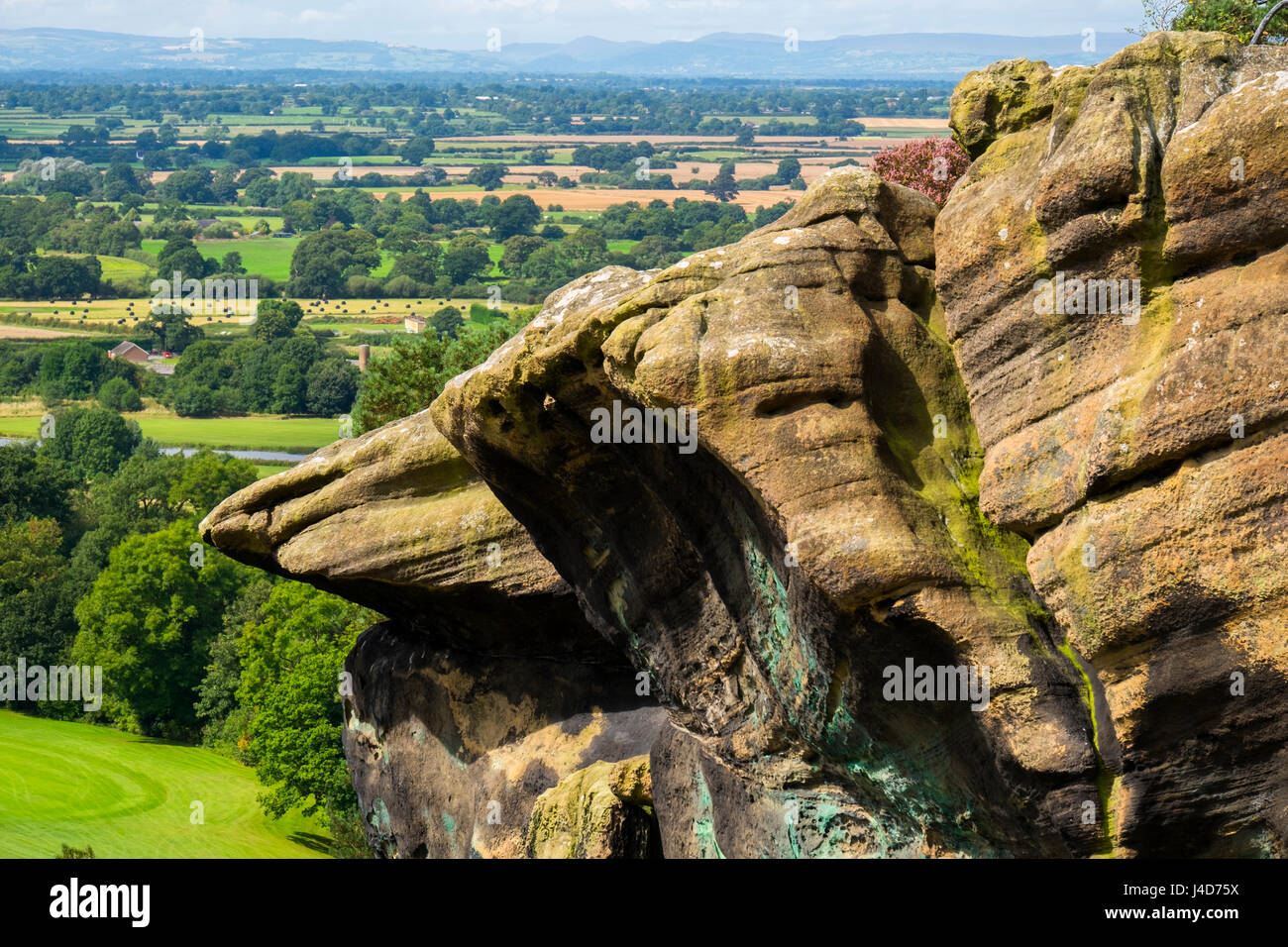 Sandstone outcrop at Hawkstone Park Follies overlooking Shropshire countryside, England, UK Stock Photo