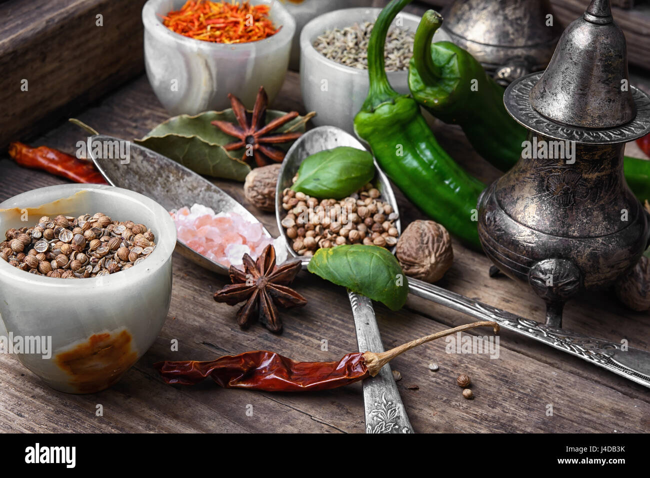 large set of Indian spices in spoons and bowls Stock Photo