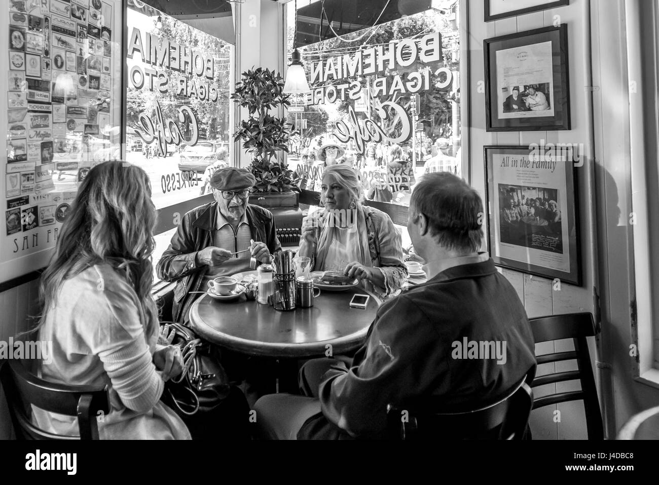 Inside Mario's Bohemian Cigar Store Cafe in San Francisco, corner table in North Beach, black and white. Stock Photo