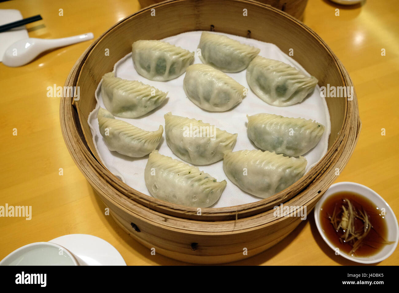 Chinese steamed dumpling in Bamboo Steamer, commonly eaten in East Asia in Beijing, China, February 23, 2016. Stock Photo