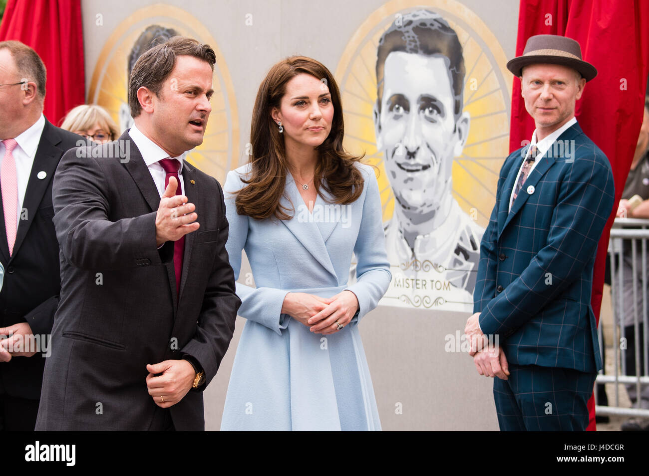 The Duchess of Cambridge and Xavier Bettel, Prime Minister of Luxembourg  (left) tour a cycling themed festival in Place de Clairefontaine  Luxembourg, and unveils a mural of British cyclist Tom Simpson and