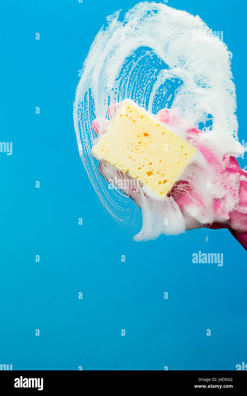 Cleaning glass window with sponge Stock Photo Alamy