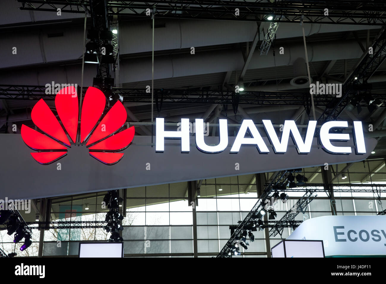 Huawei company logo on the wall. Huawei Technologies Co. is a Chinese multinational networking and telecommunications equipment and services company Stock Photo